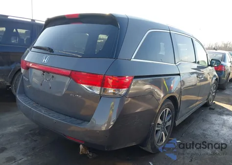 2014 Honda Odyssey Touring/Touring Elite z USA, uszkodzony, nr VIN 5FNRL5H9XEB003947